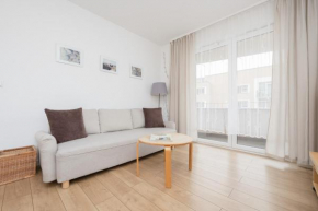 Słoneczny Apartament z Parkingiem by Noclegi Renters
